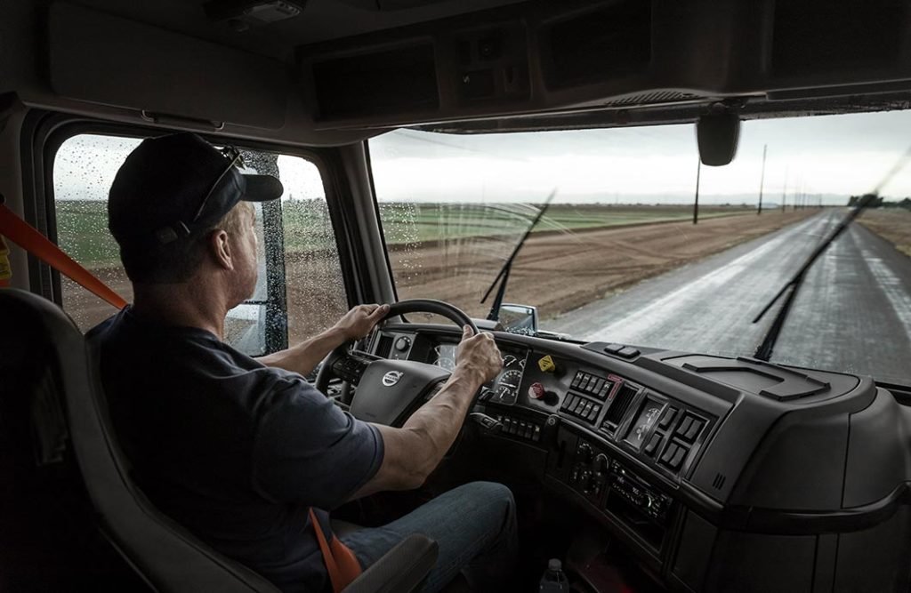 How a driver should sit behind the wheel